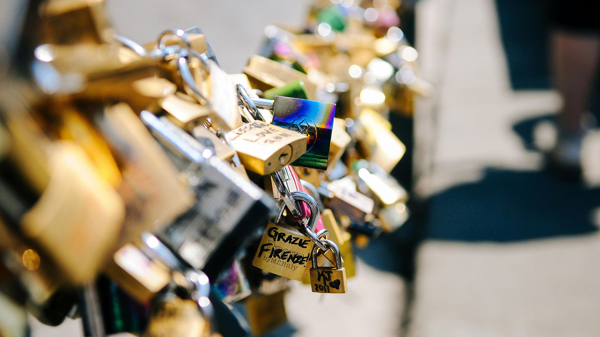 many multi-colored padlocks